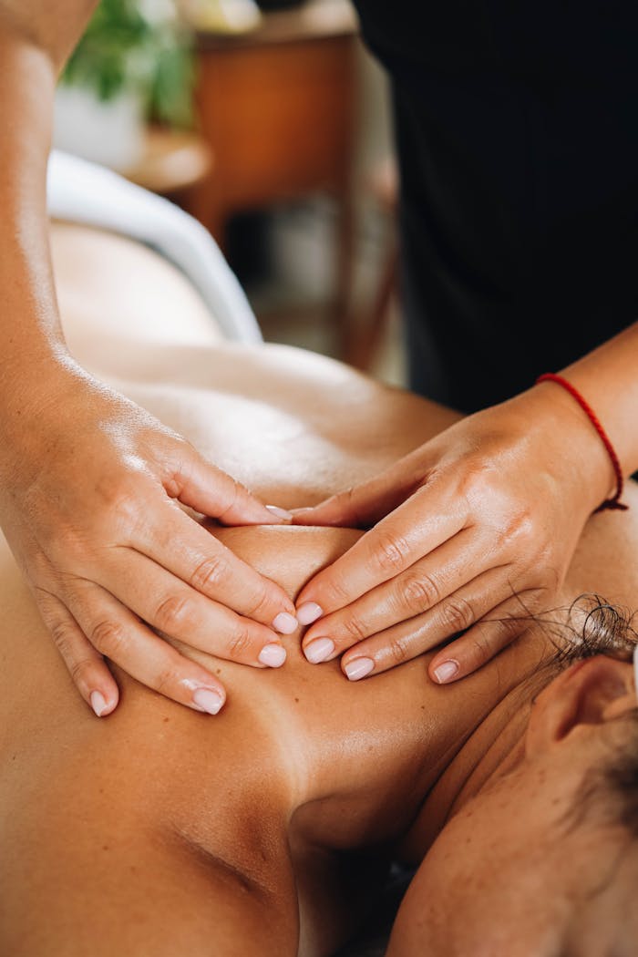 services-03 Close-up of a relaxing massage focusing on well-being and wellness in a tranquil spa setting.